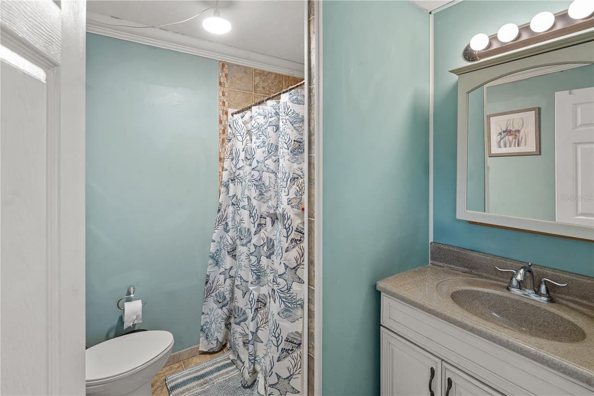 26015 SACKAMAXON DRIVE — photo 15 of 28