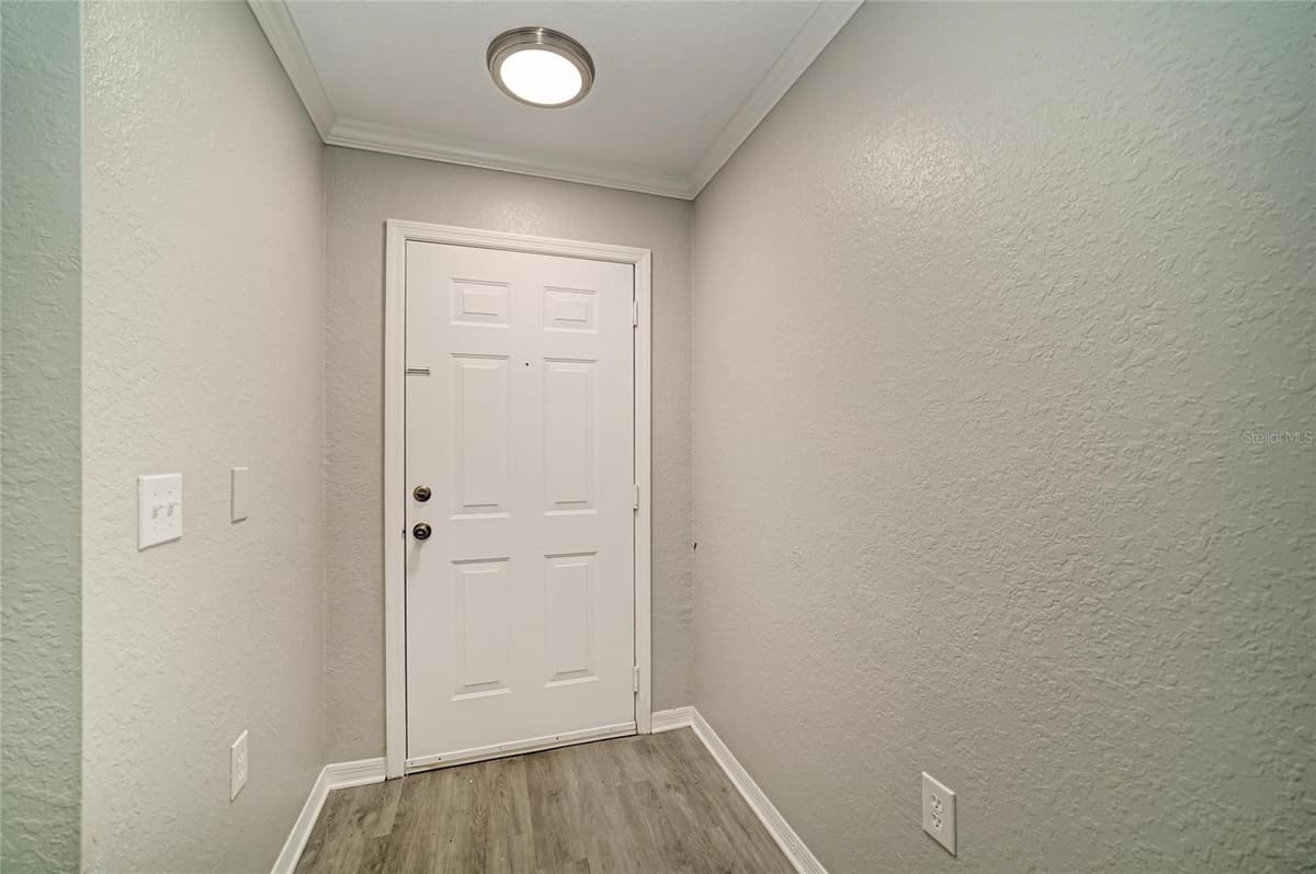 8932 MANOR LOOP — photo 5 of 49