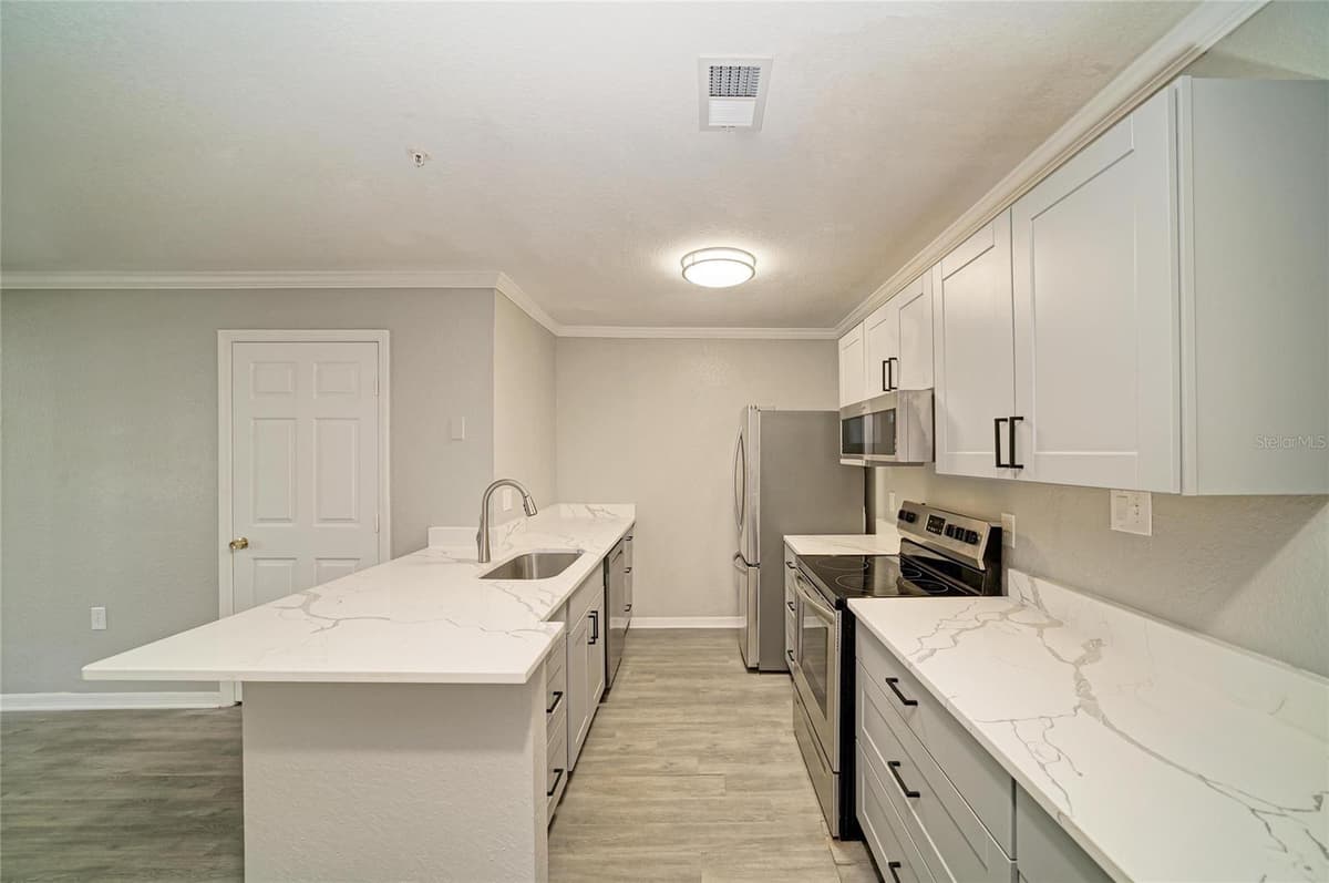 8932 MANOR LOOP — photo 16 of 49