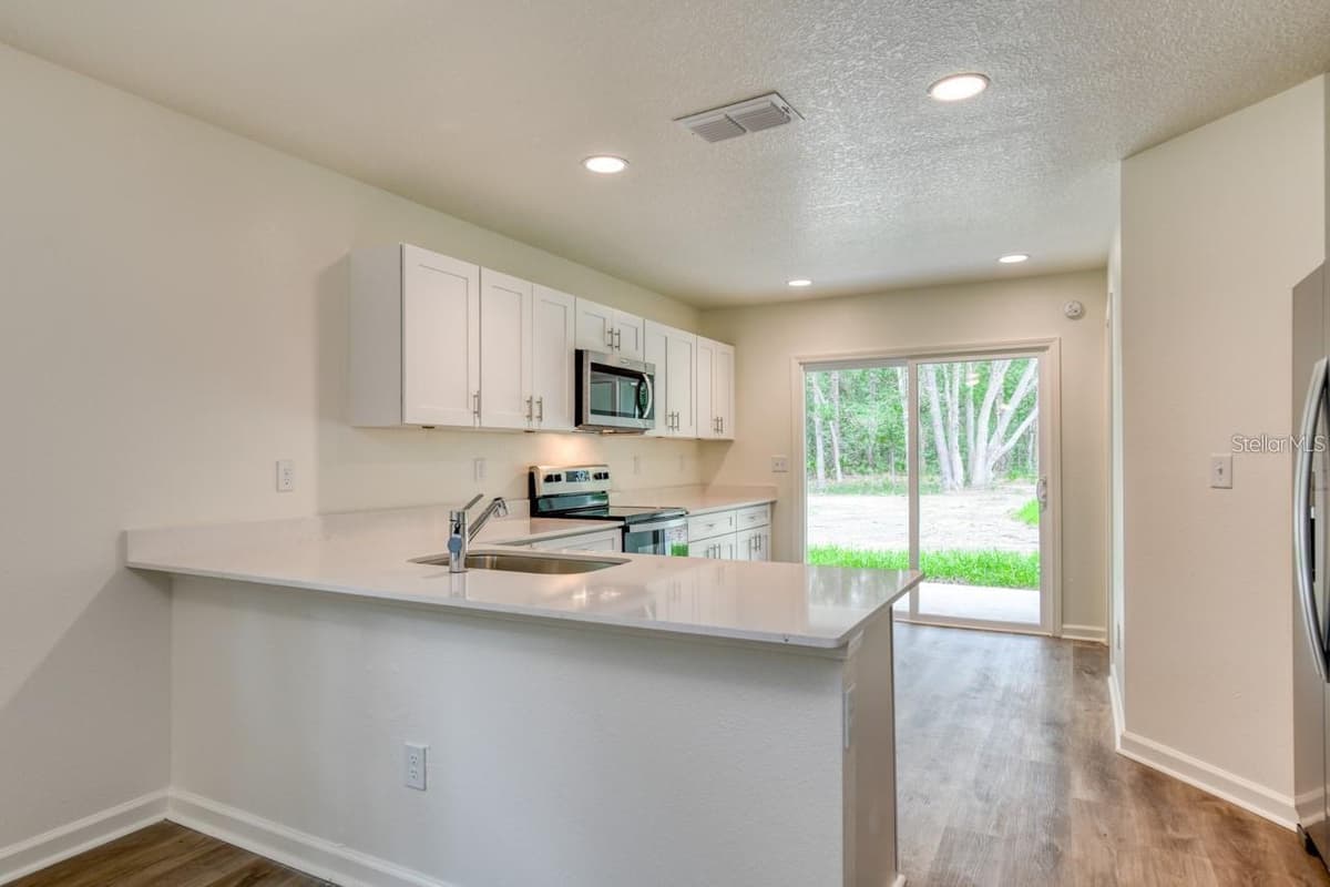 10010 MCMAHON AVENUE — photo 5 of 22