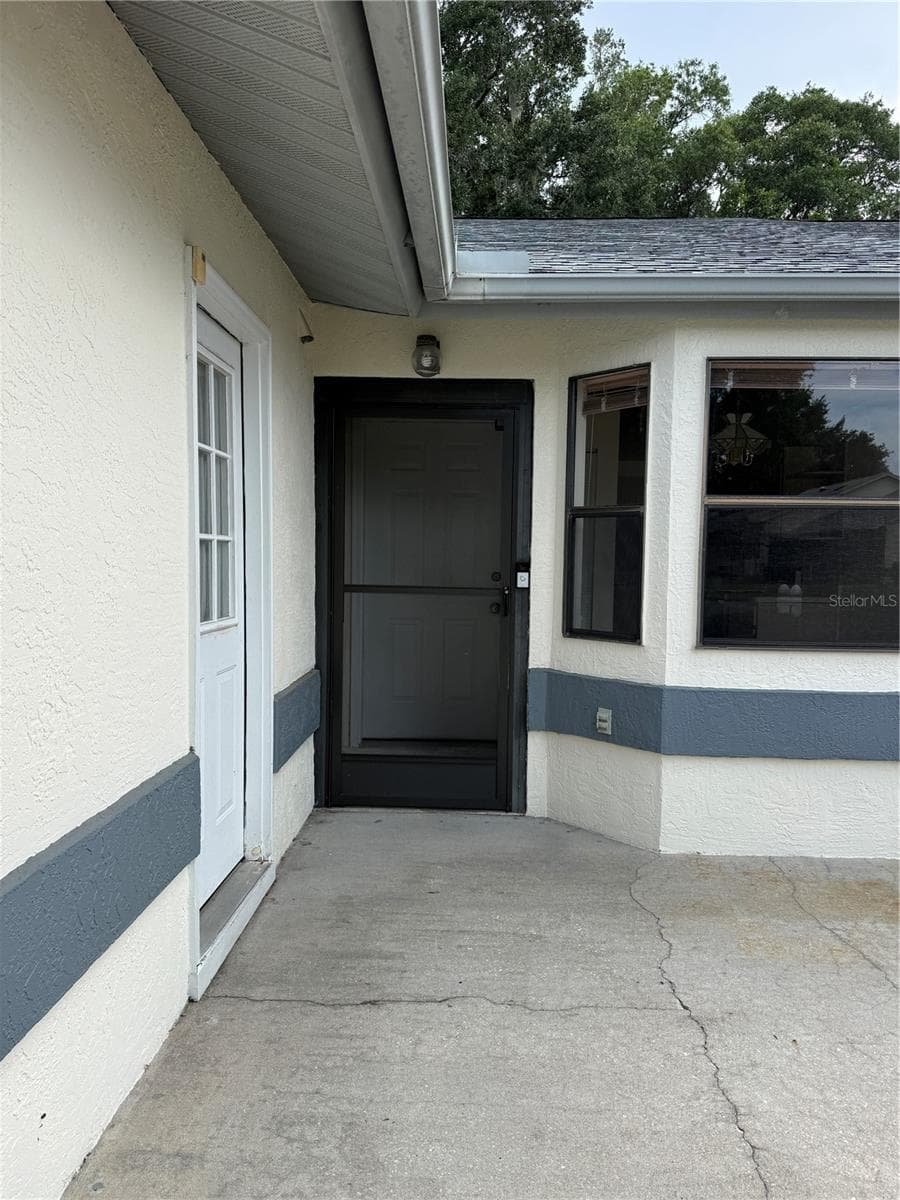 517 WHISPERING PINES BOULEVARD — photo 6 of 43