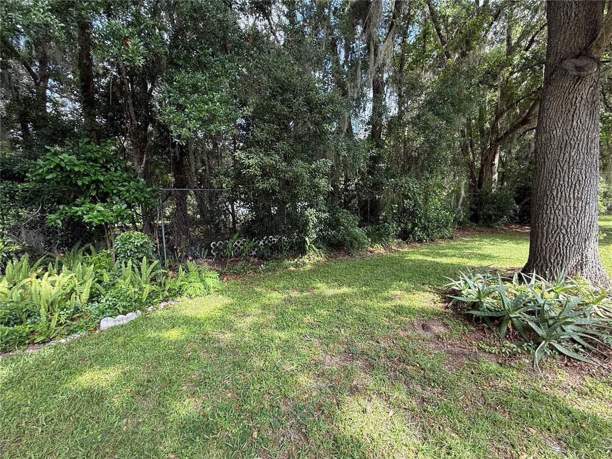517 WHISPERING PINES BOULEVARD — photo 2 of 43