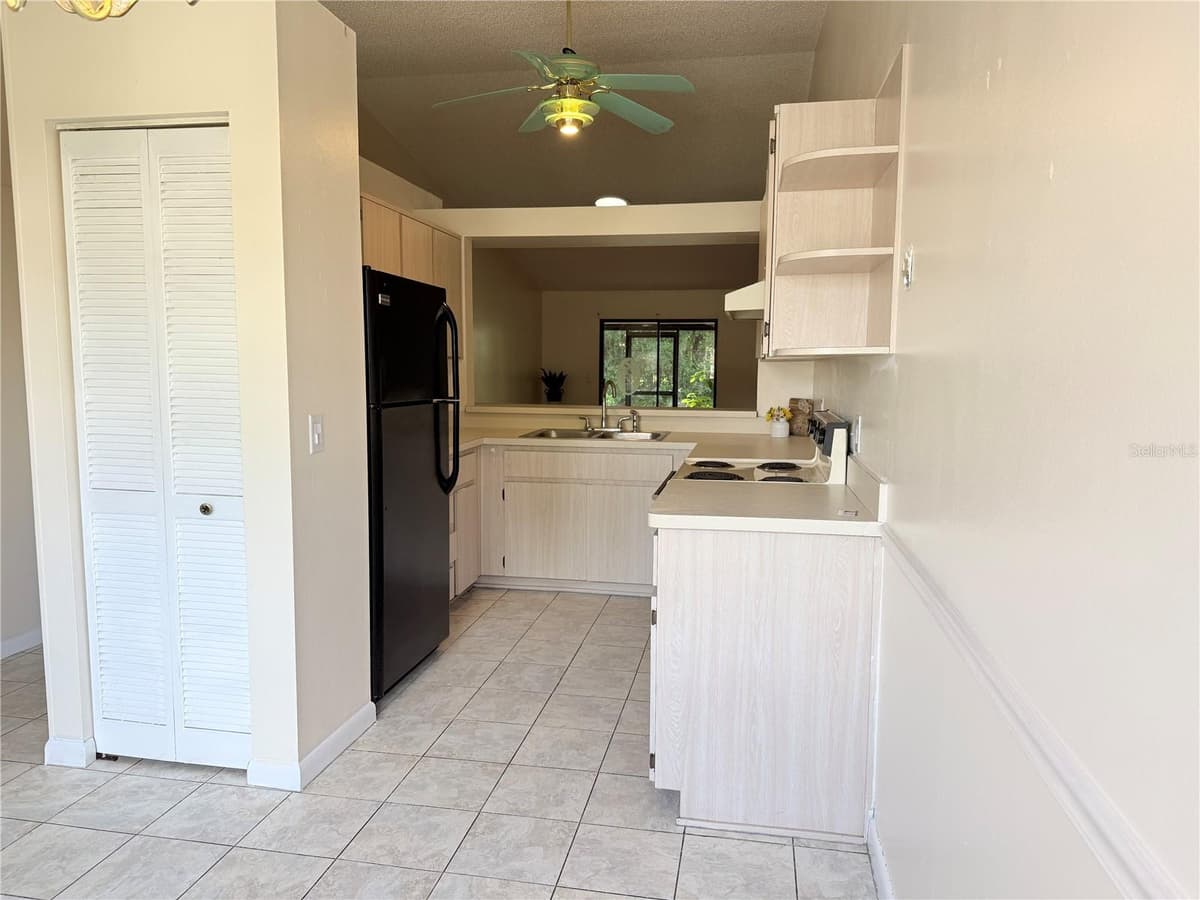 517 WHISPERING PINES BOULEVARD — photo 10 of 43
