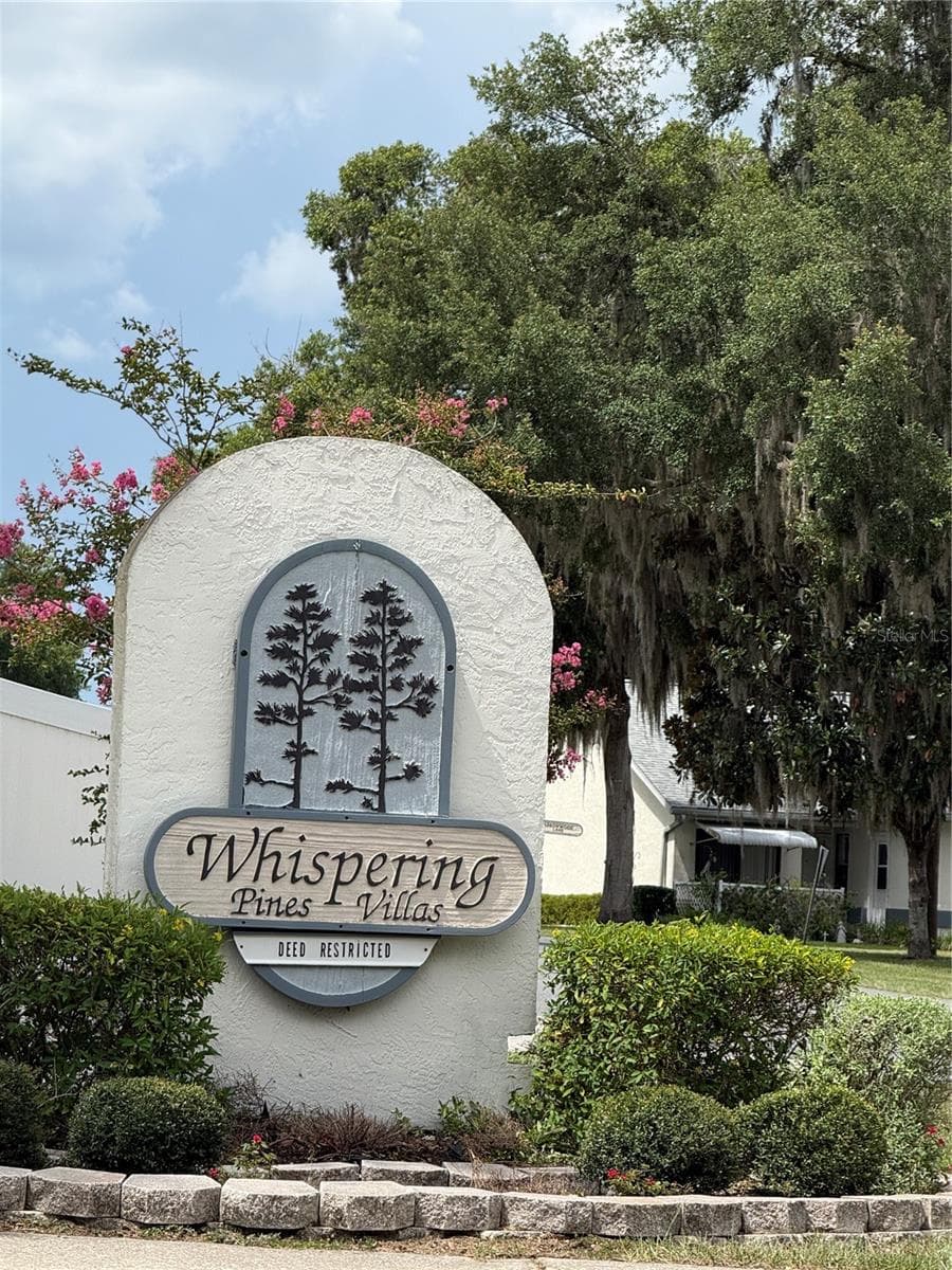 517 WHISPERING PINES BOULEVARD — photo 3 of 43