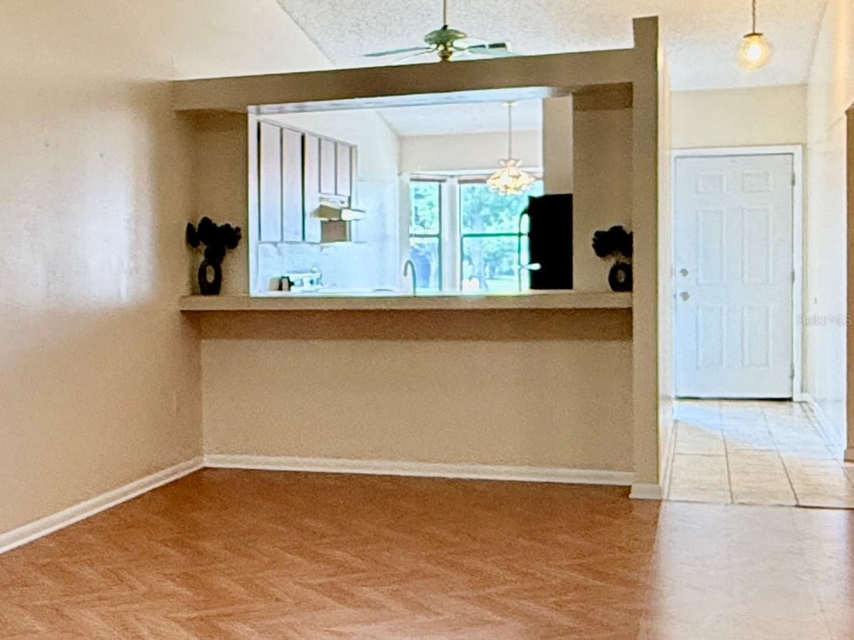 517 WHISPERING PINES BOULEVARD — photo 9 of 43
