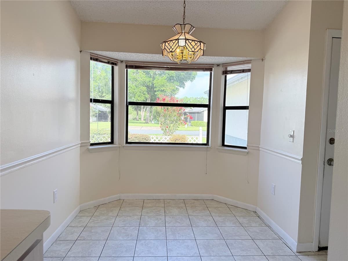 517 WHISPERING PINES BOULEVARD — photo 12 of 43