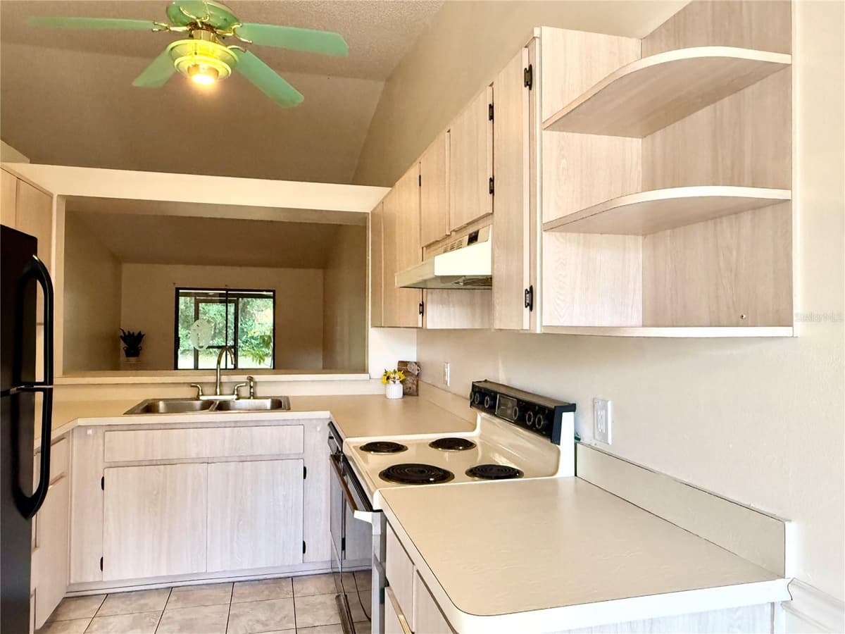 517 WHISPERING PINES BOULEVARD — photo 11 of 43