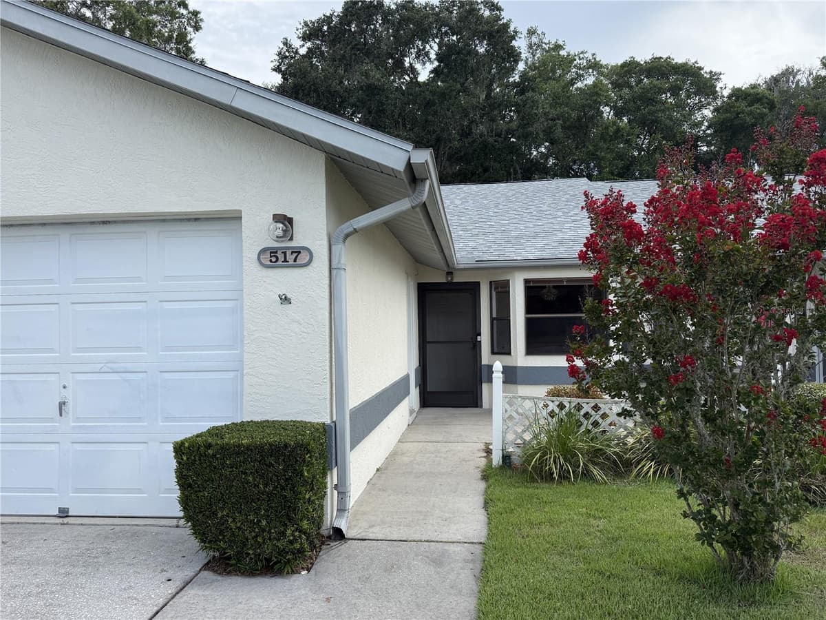 517 WHISPERING PINES BOULEVARD — photo 1 of 43