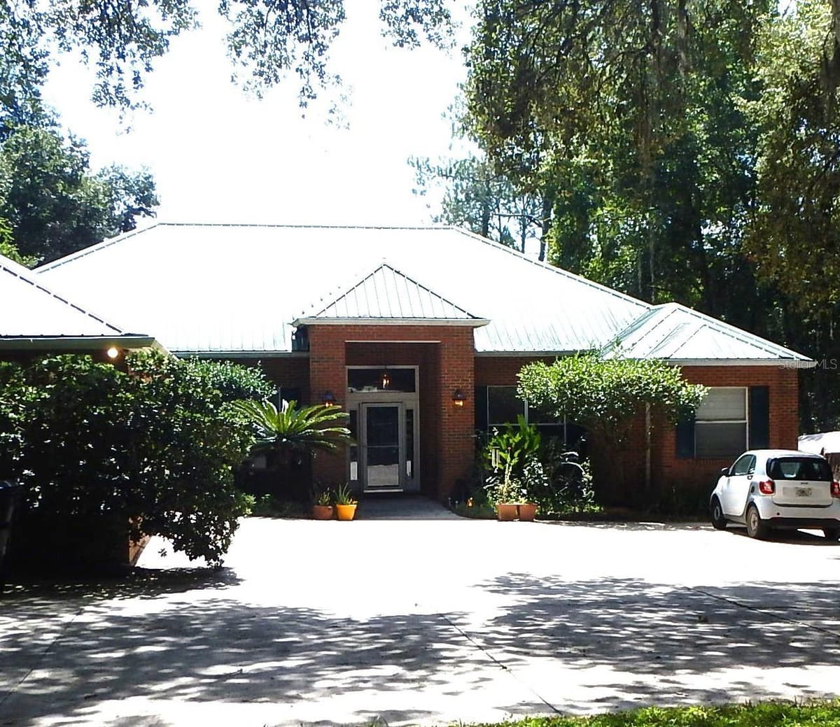 8315 LILLY LAKE ROAD — photo 1 of 47