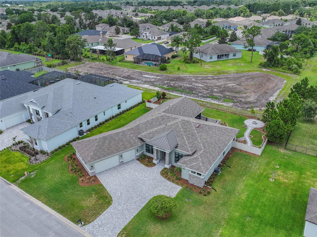 6545 EMERALD WOODS LANE — photo 3 of 55