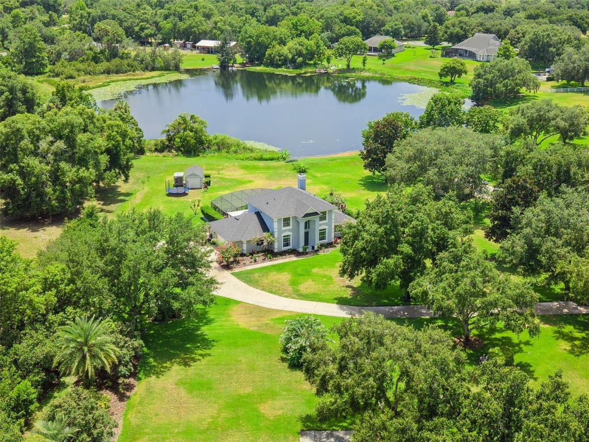 7648 LAKE ANGELINA DRIVE — photo 1 of 49