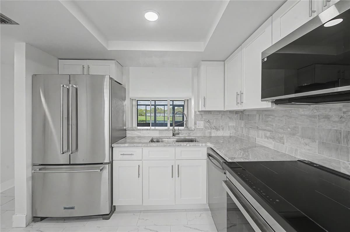 2618 COVE CAY DRIVE — photo 8 of 49