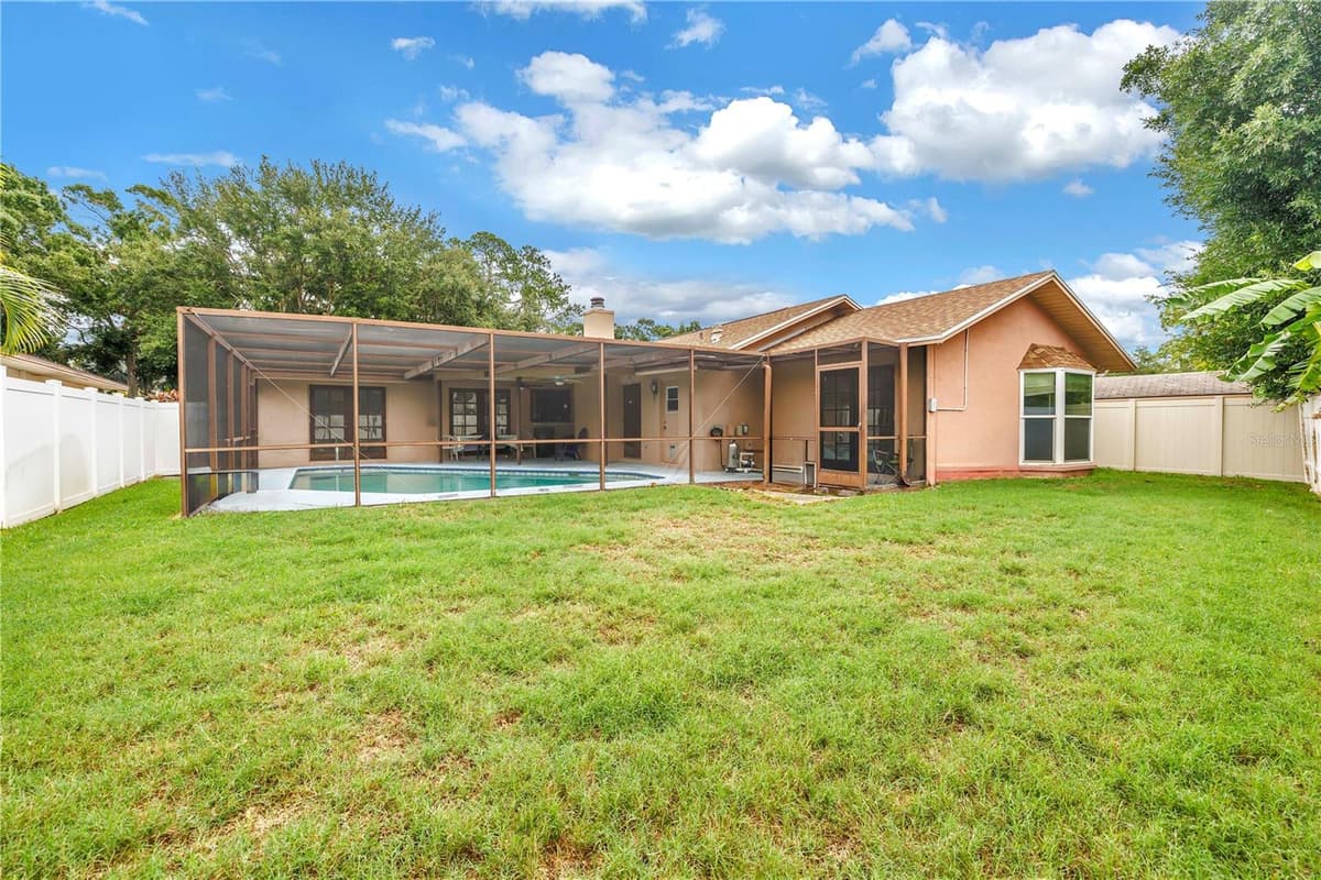 9212 RUSTIC PINES BOULEVARD — photo 3 of 31