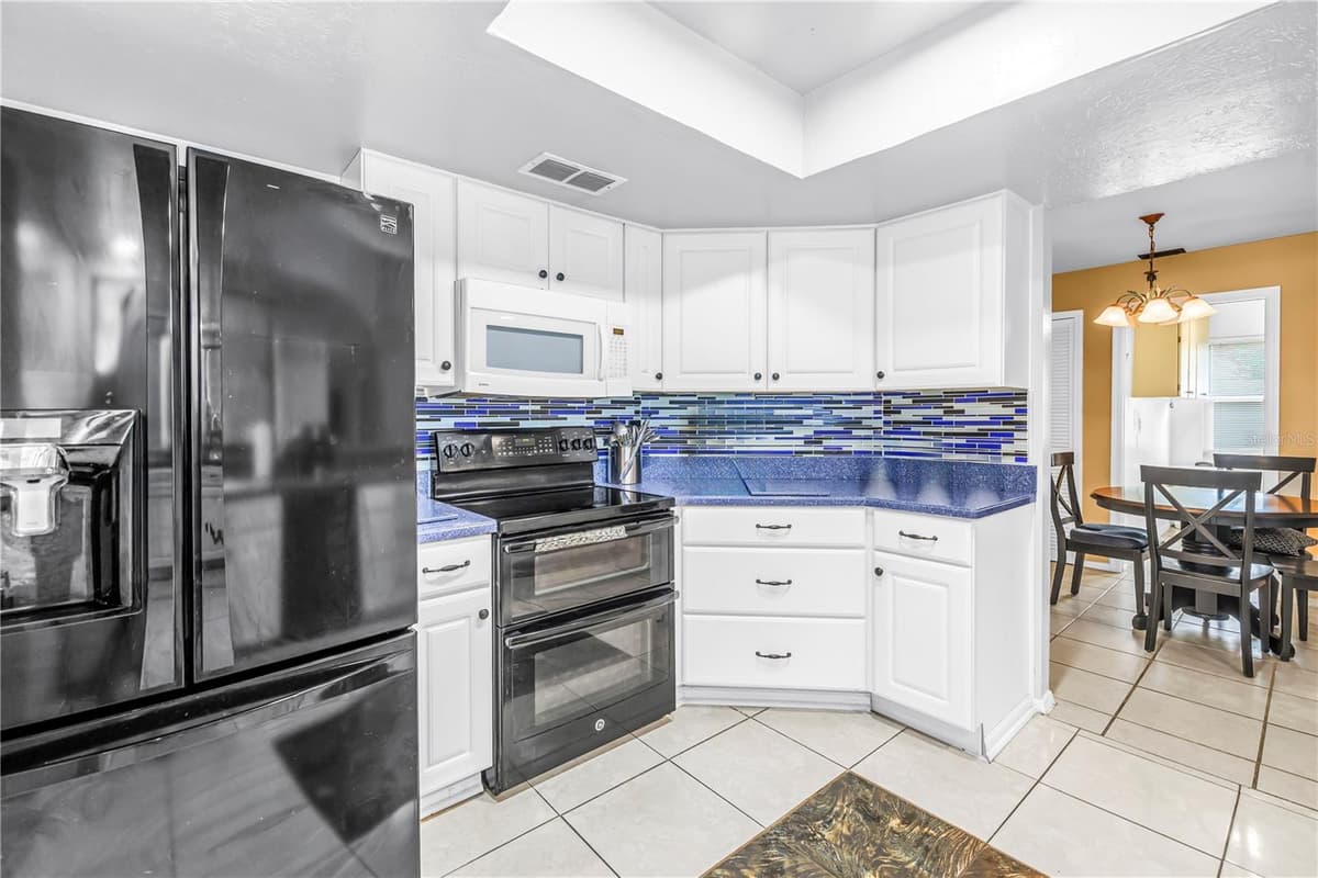 9212 RUSTIC PINES BOULEVARD — photo 8 of 31