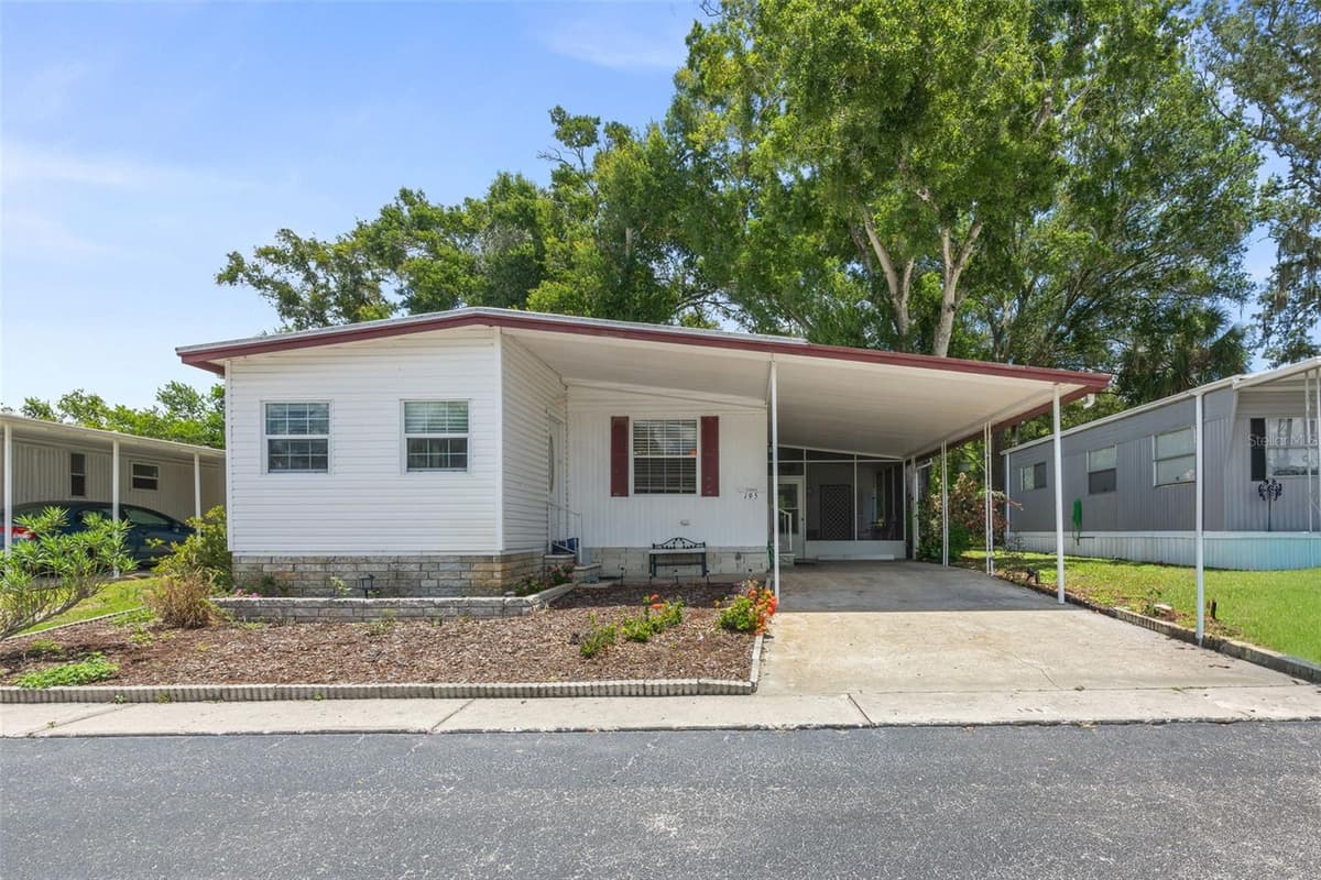 15601 LAKESHORE VILLA LOOP — photo 4 of 44