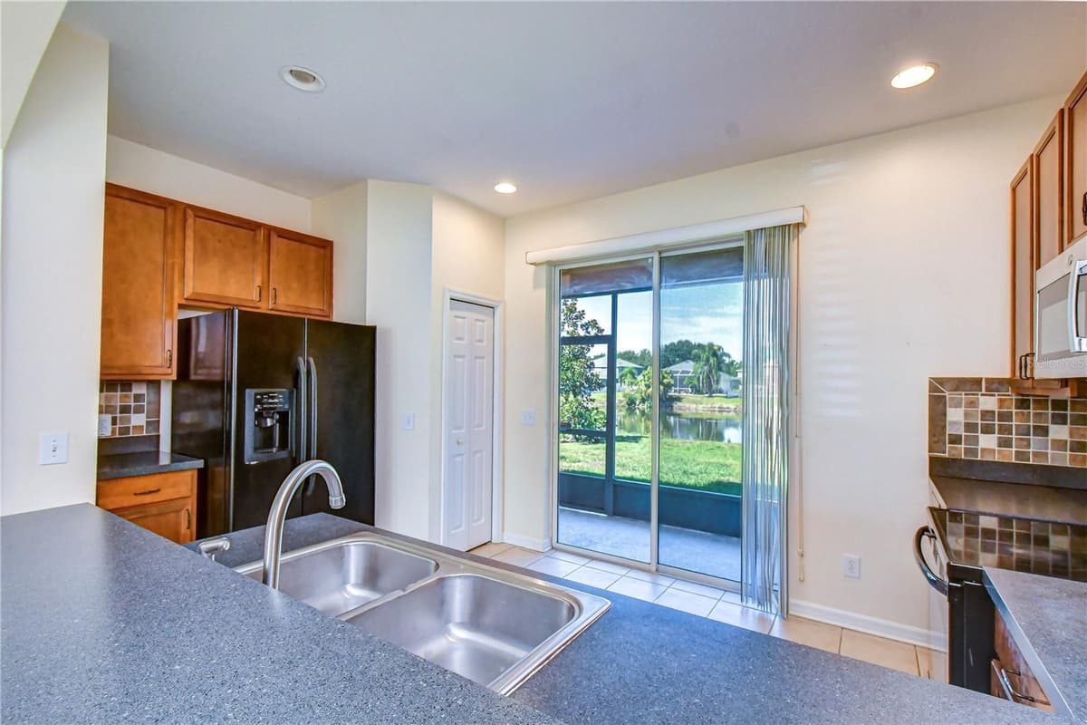 6919 TOWERING SPRUCE DR — photo 15 of 36