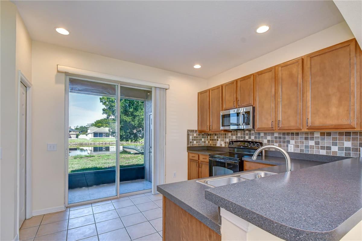 6919 TOWERING SPRUCE DR — photo 14 of 36