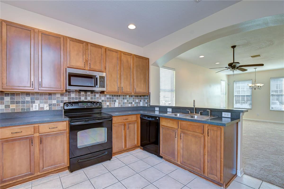6919 TOWERING SPRUCE DR — photo 16 of 36