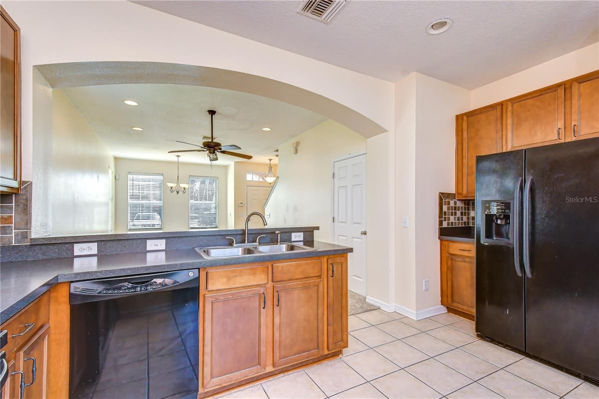 6919 TOWERING SPRUCE DR — photo 17 of 36