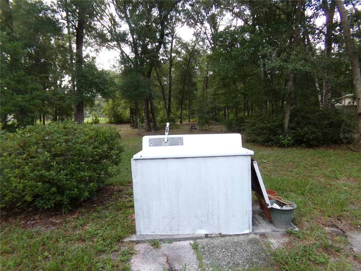 12199 44TH DRIVE — photo 11 of 54
