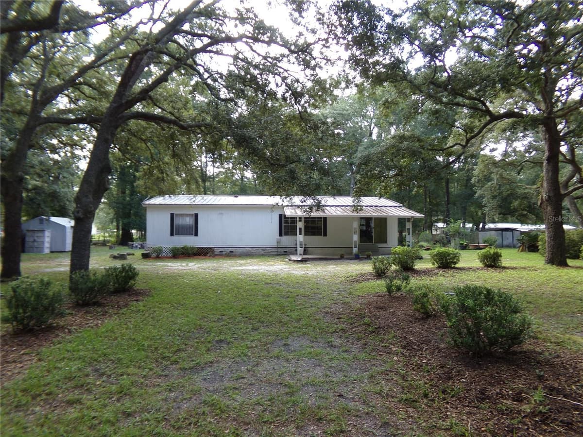 12199 44TH DRIVE — photo 3 of 54