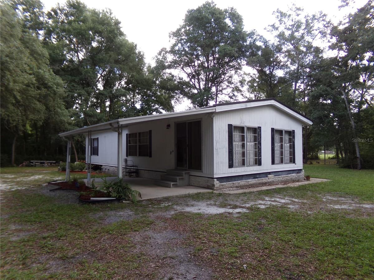 12199 44TH DRIVE — photo 7 of 54