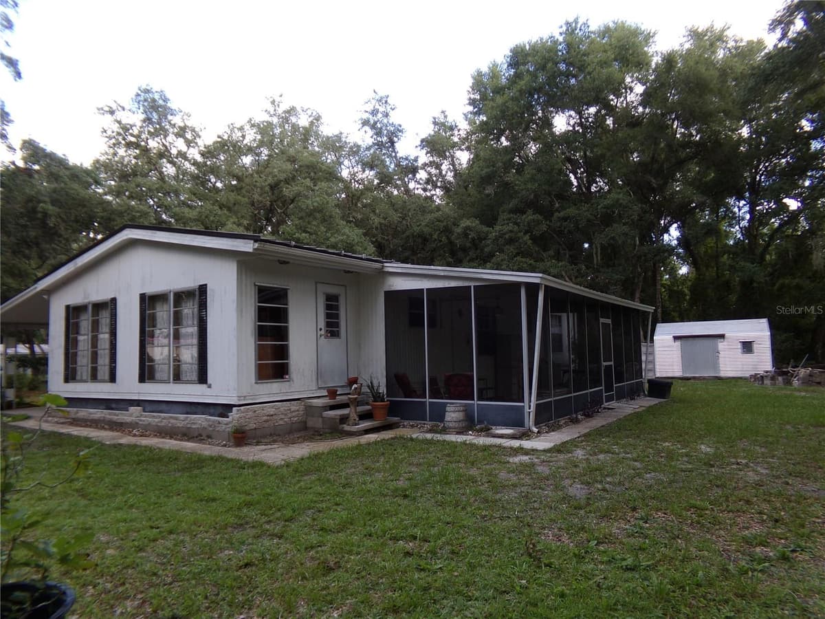 12199 44TH DRIVE — photo 6 of 54
