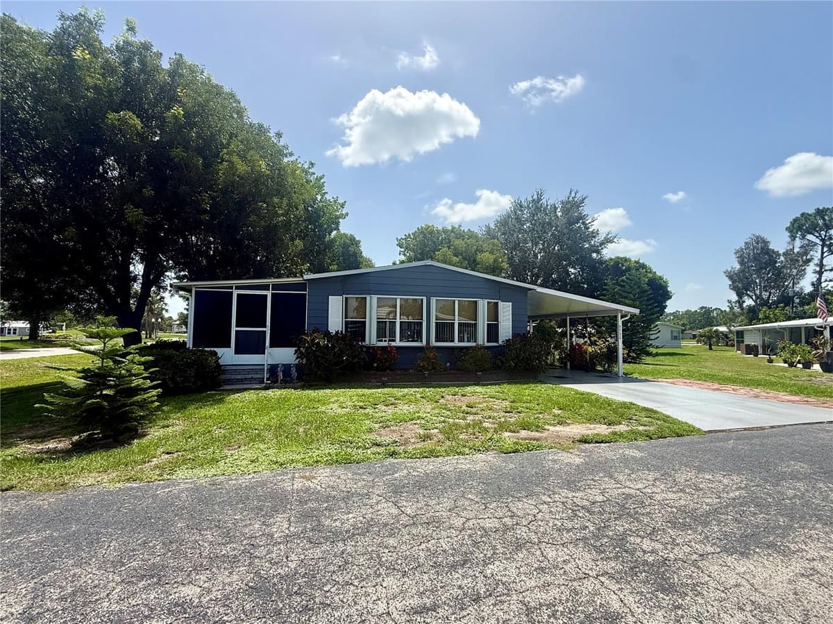 9735 LAKE FAIRWAYS BOULEVARD — photo 1 of 34