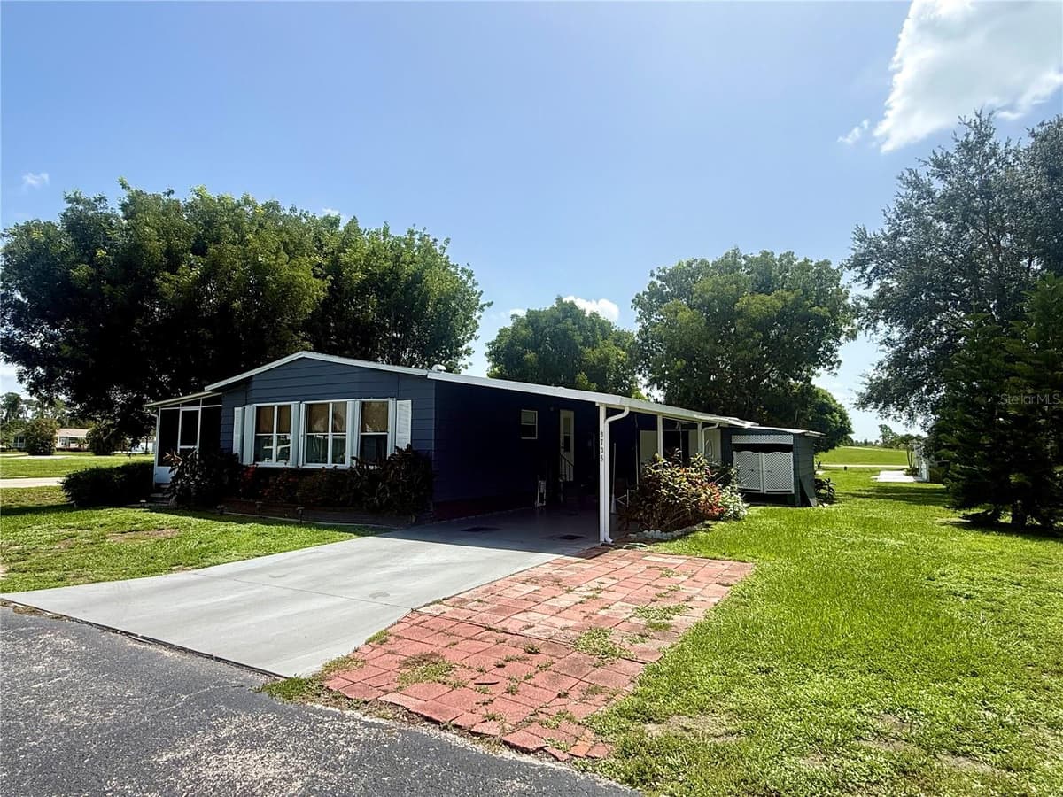 9735 LAKE FAIRWAYS BOULEVARD — photo 3 of 34