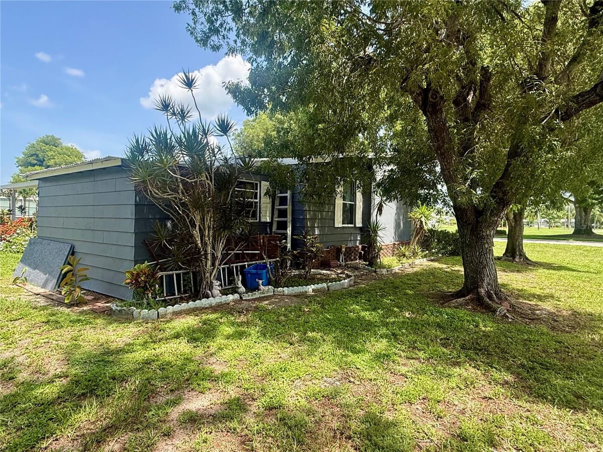 9735 LAKE FAIRWAYS BOULEVARD — photo 6 of 34