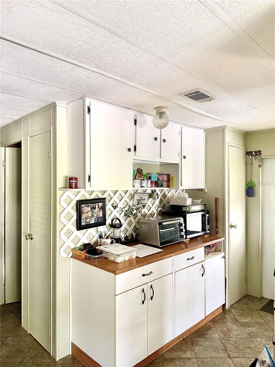 9735 LAKE FAIRWAYS BOULEVARD — photo 11 of 34