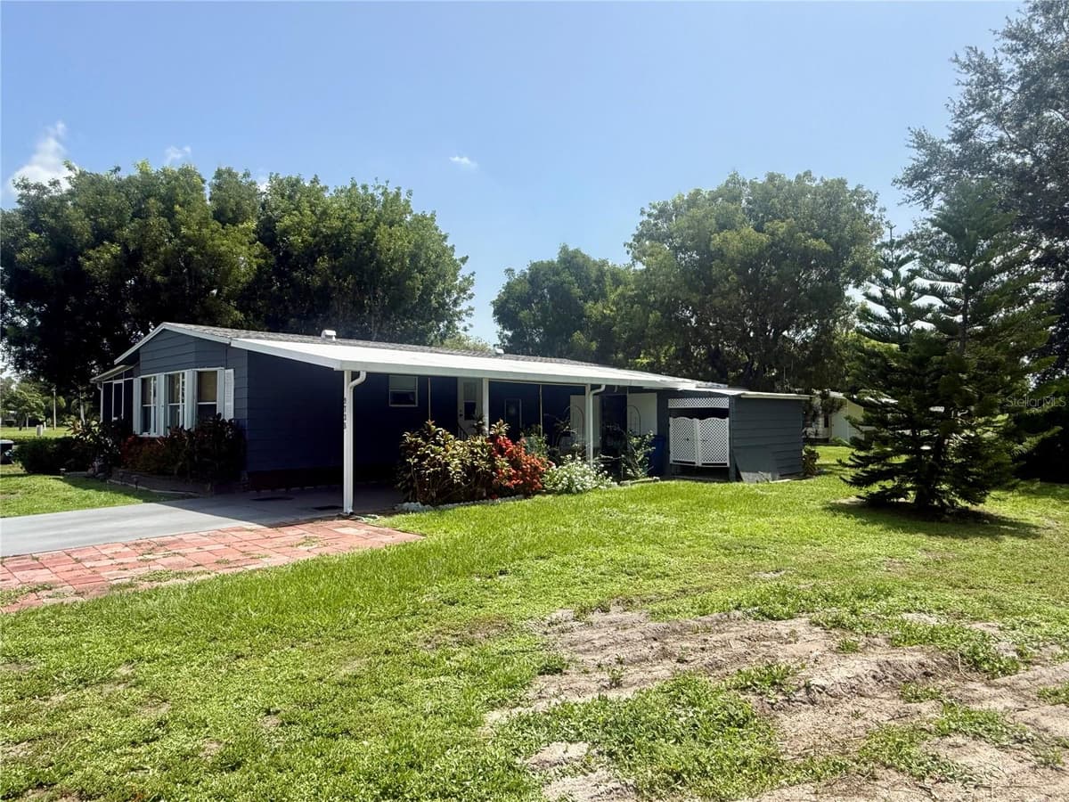 9735 LAKE FAIRWAYS BOULEVARD — photo 4 of 34