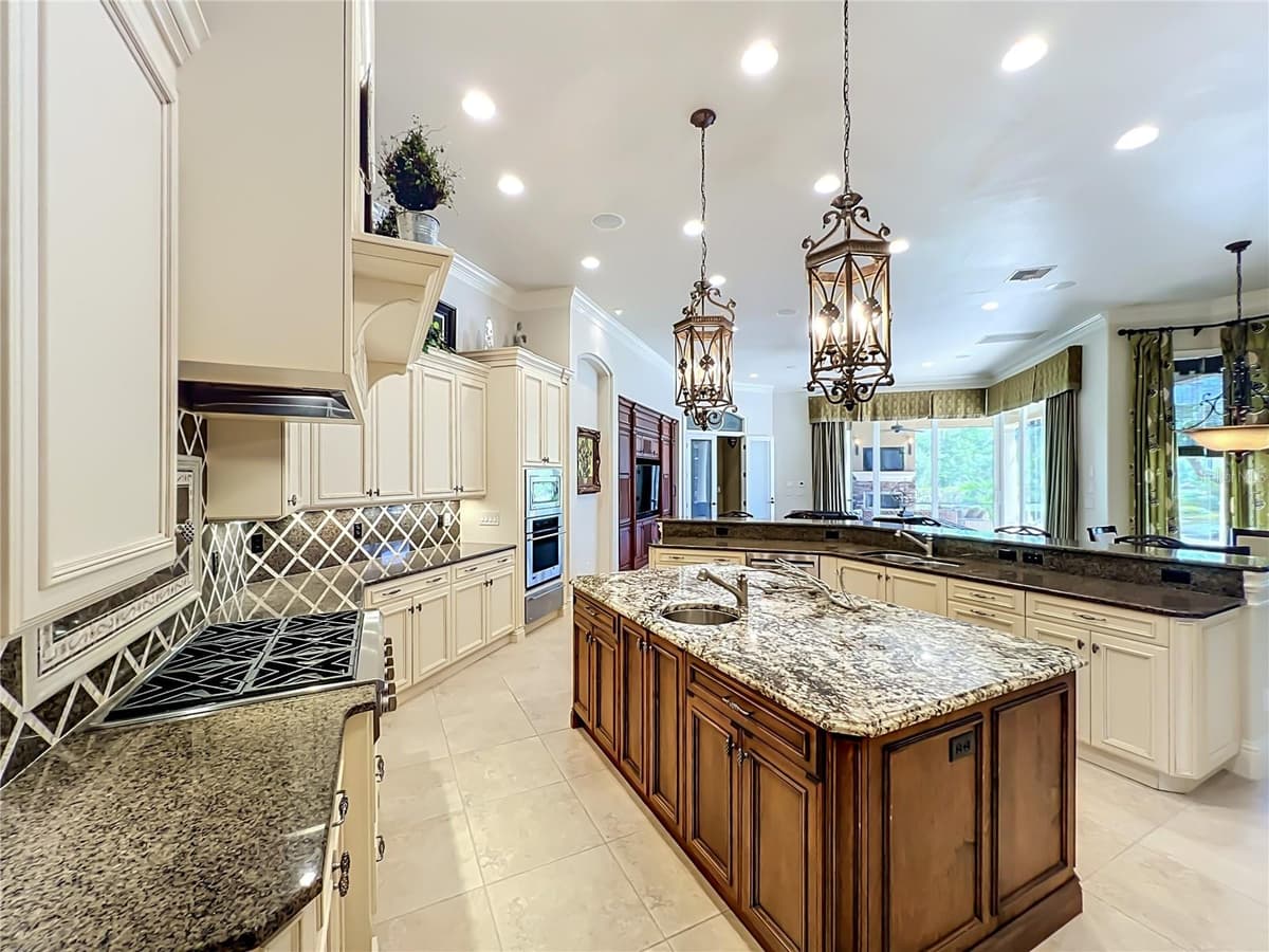 16028 PENDIO DRIVE — photo 15 of 100
