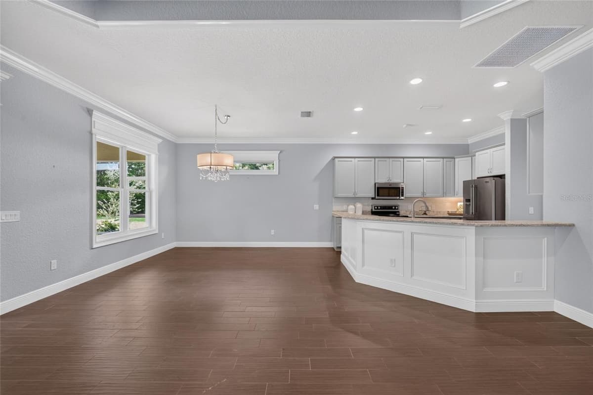 10216 JULIA ISLES AVENUE — photo 11 of 56