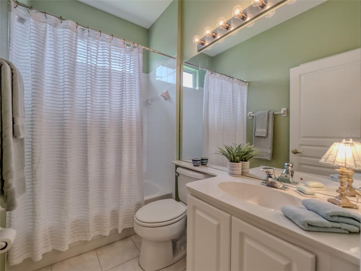8310 WHISPERING WOODS COURT — photo 44 of 67