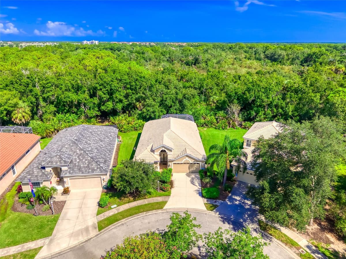 8310 WHISPERING WOODS COURT — photo 9 of 67