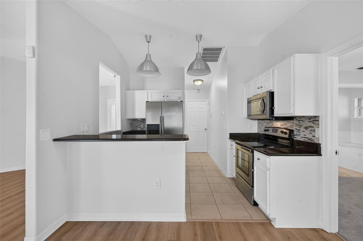 719 WAXWING COURT — photo 8 of 24