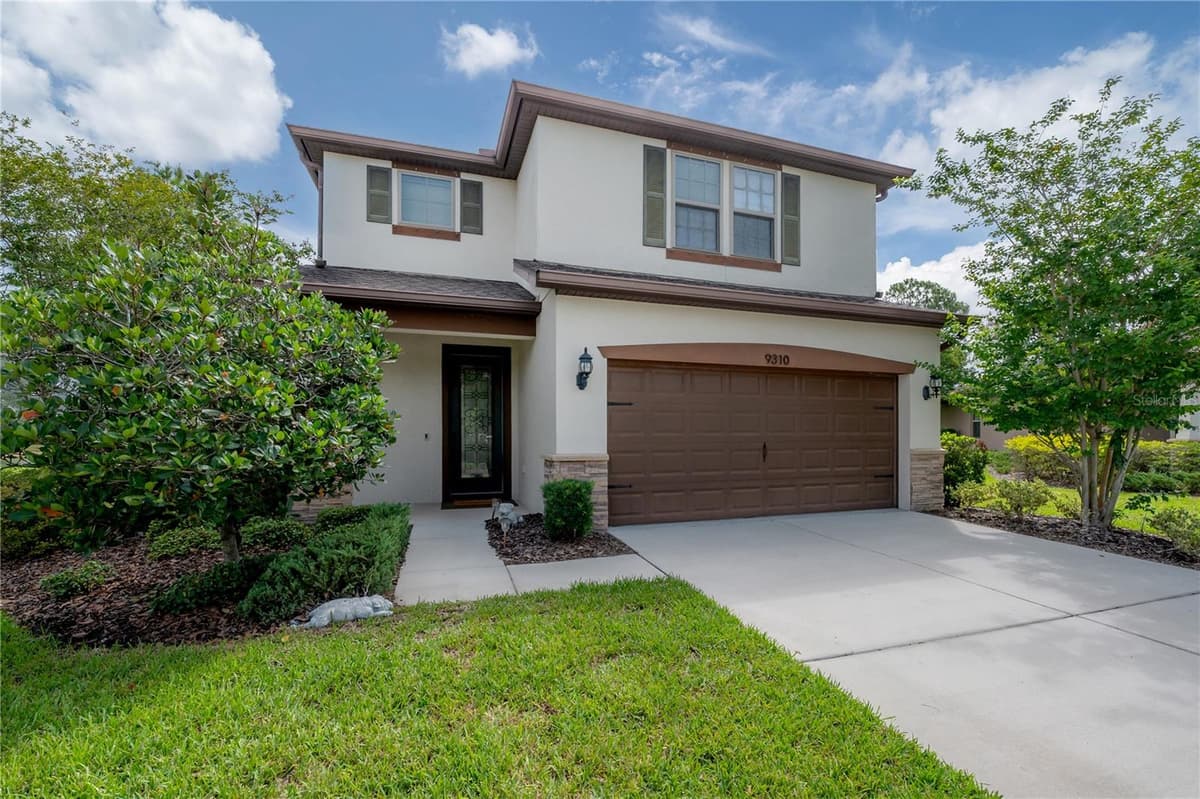 9310 BLUEBERRY ASH CIRCLE — photo 1 of 53