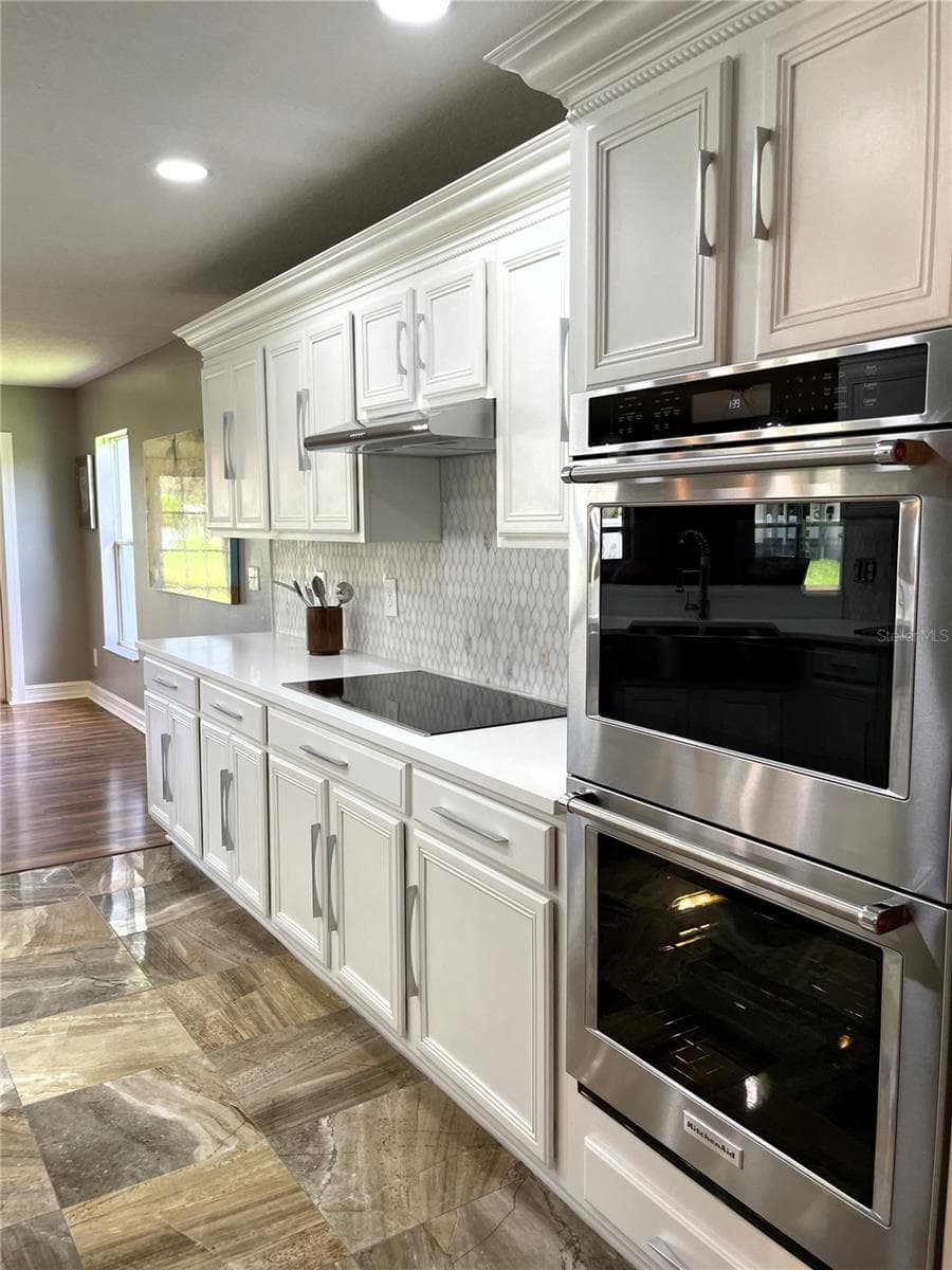 5036 WHISTLING PINES COURT — photo 7 of 33