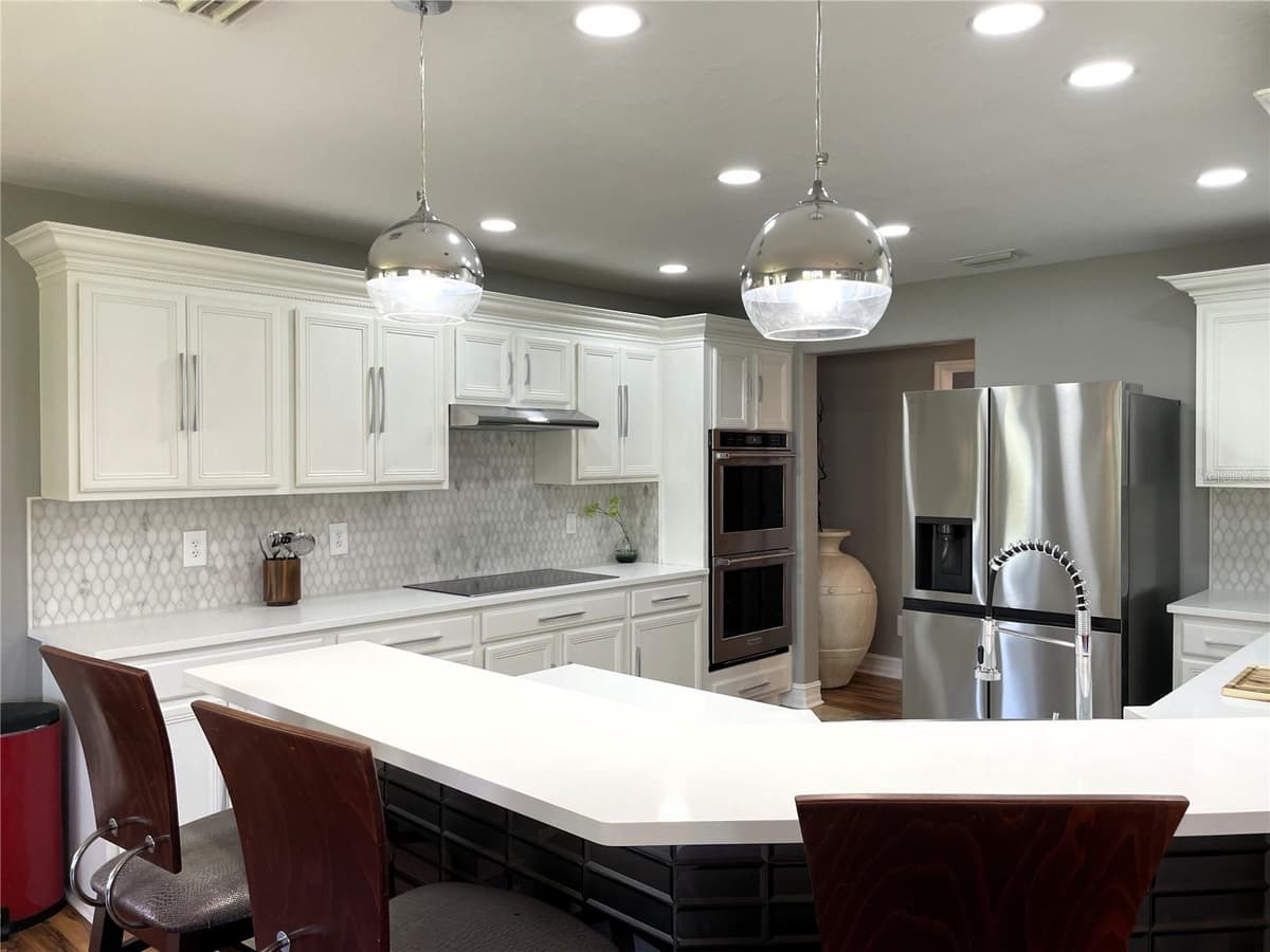 5036 WHISTLING PINES COURT — photo 6 of 33