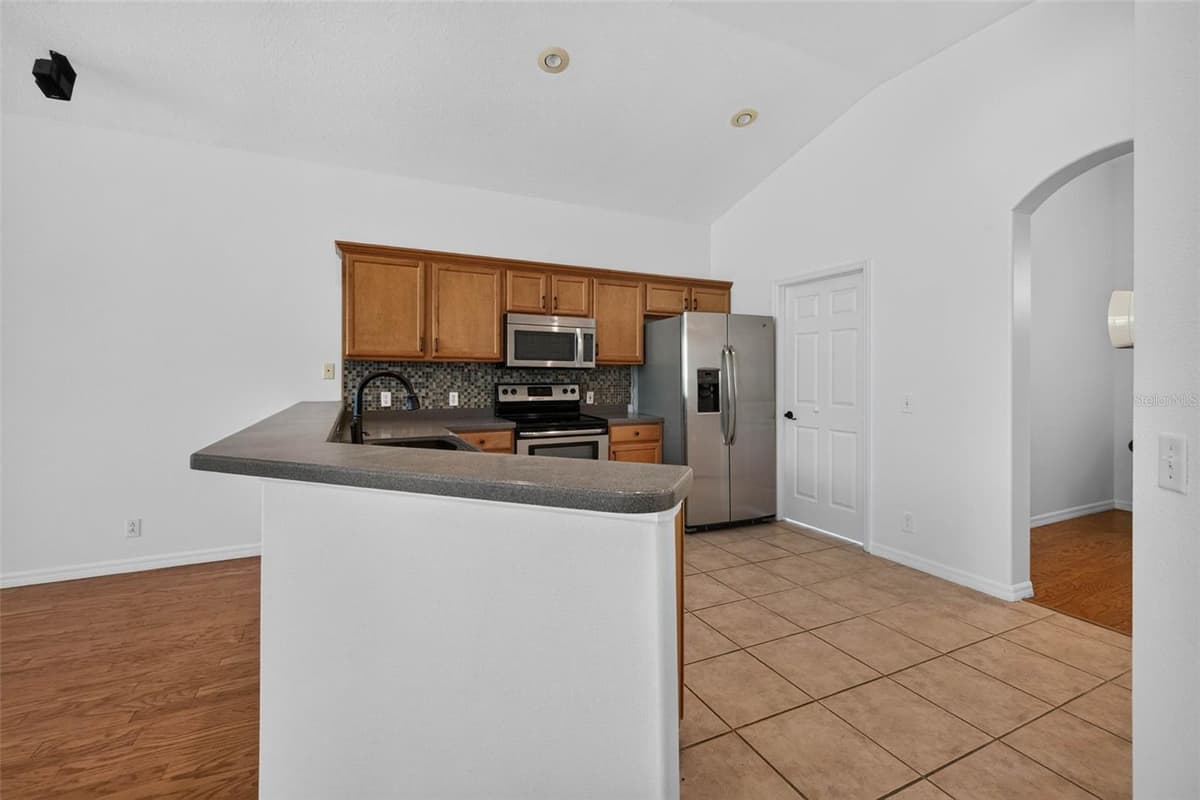 7075 BAYOU WEST PLACE — photo 15 of 43