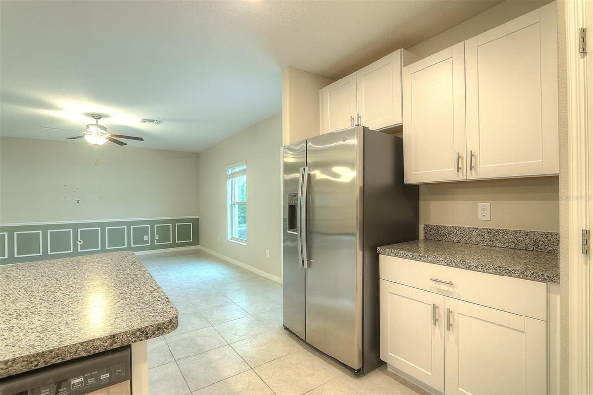 7217 RONNIE GARDENS COURT — photo 8 of 38