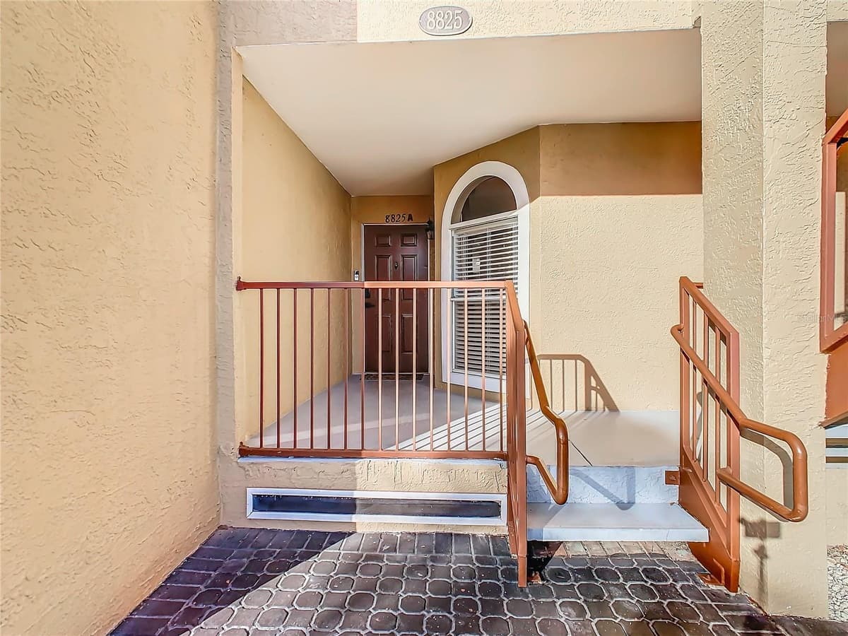 8825 CORAL PALMS COURT — photo 2 of 59
