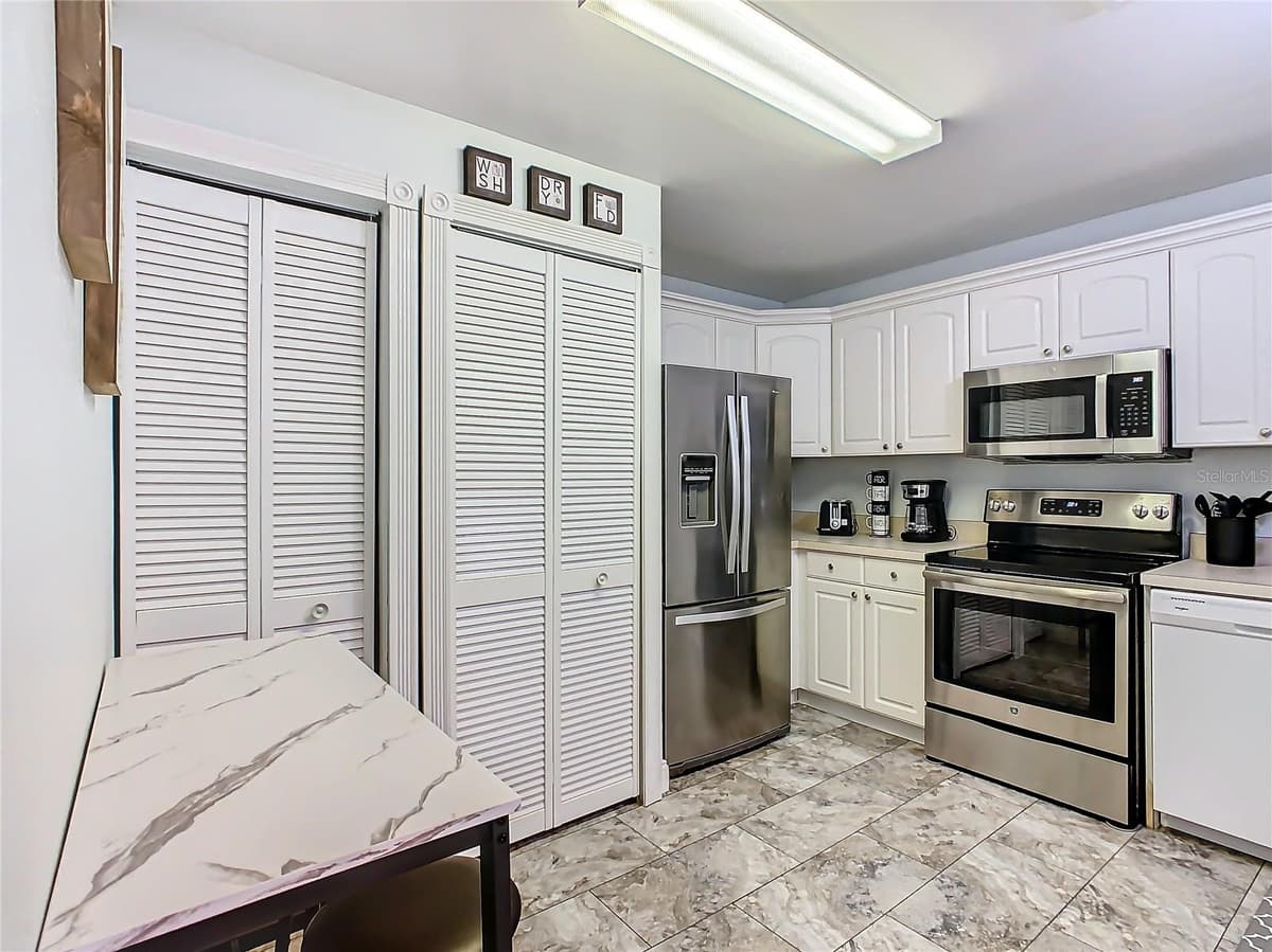 8825 CORAL PALMS COURT — photo 5 of 59