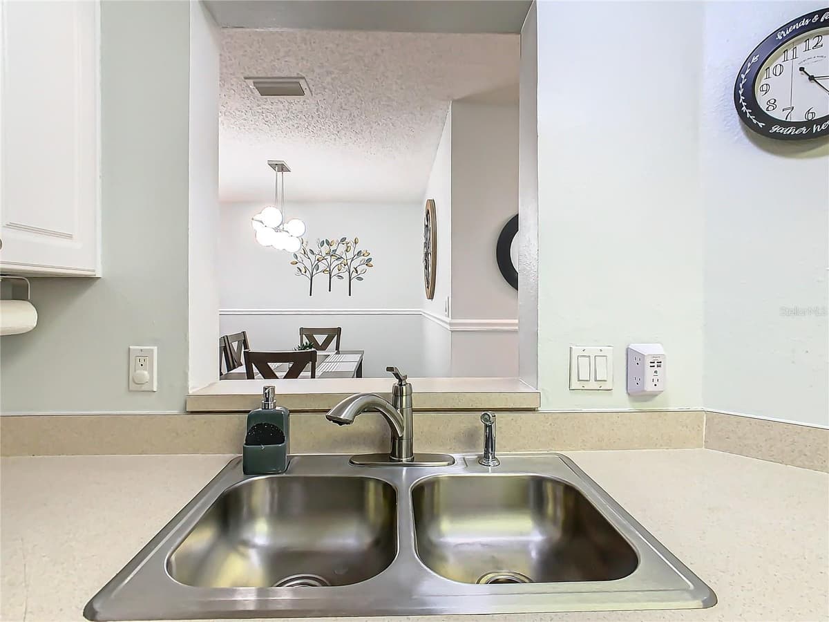 8825 CORAL PALMS COURT — photo 7 of 59