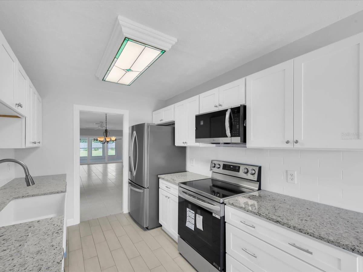 295 BOCA CIEGA POINT BOULEVARD — photo 10 of 54