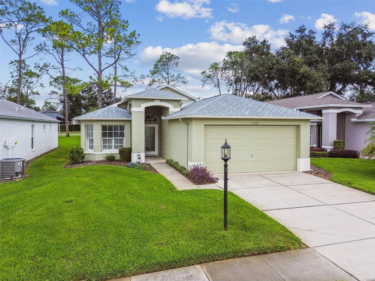11647 WHEATFIELD LOOP — photo 3 of 78