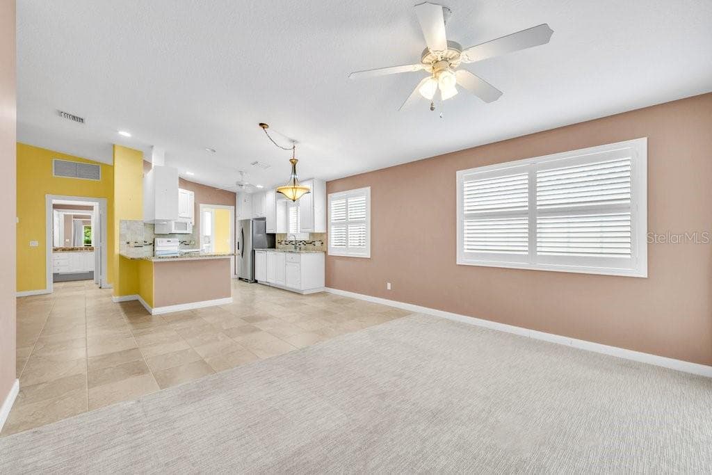 7617 CAMMINARE DRIVE — photo 9 of 64