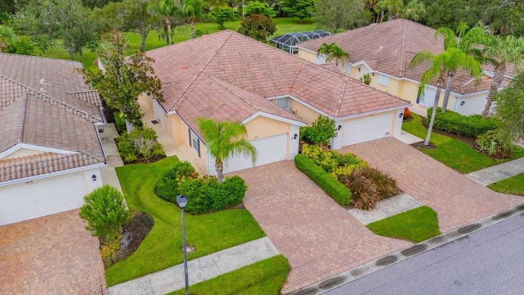 7617 CAMMINARE DRIVE — photo 3 of 64