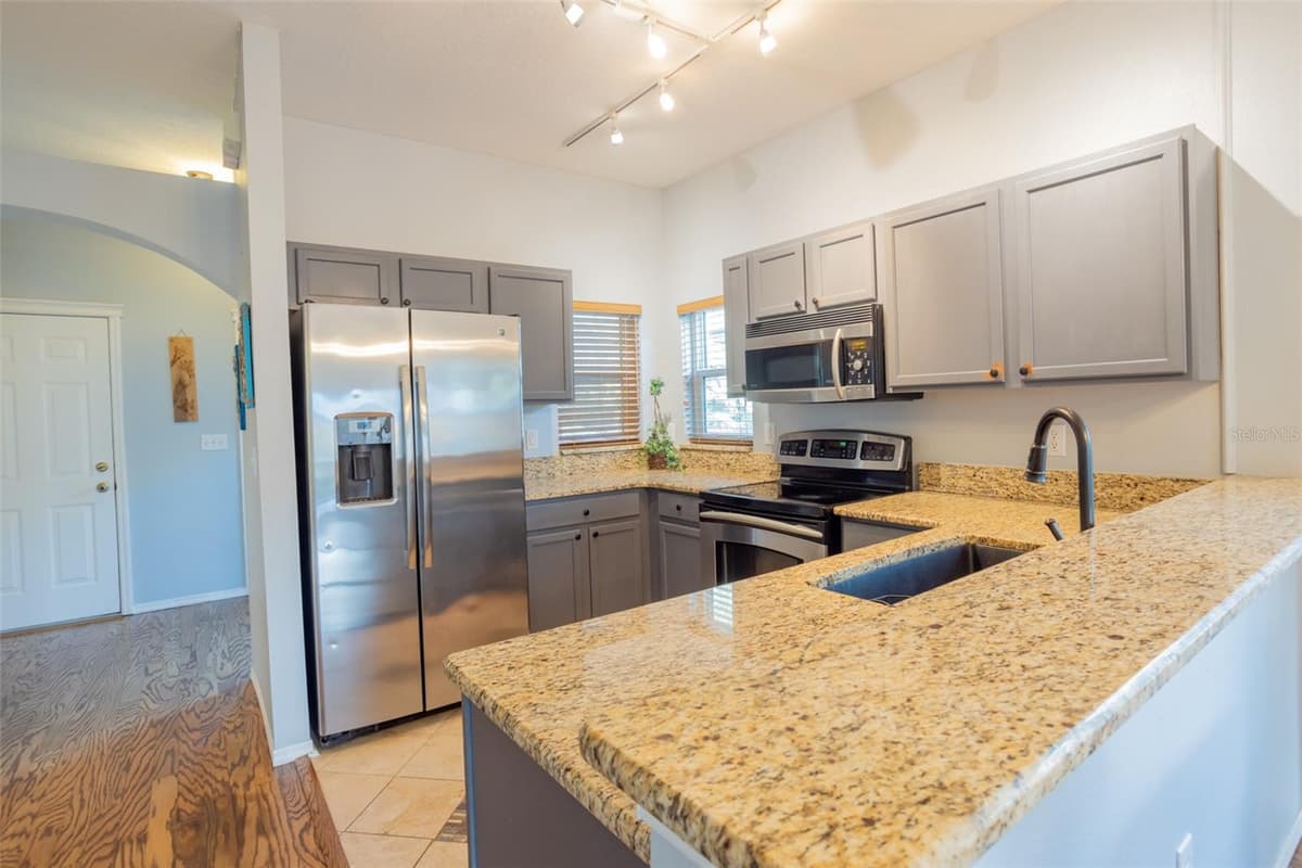 7603 DEVONBRIDGE GARDEN WAY — photo 9 of 29
